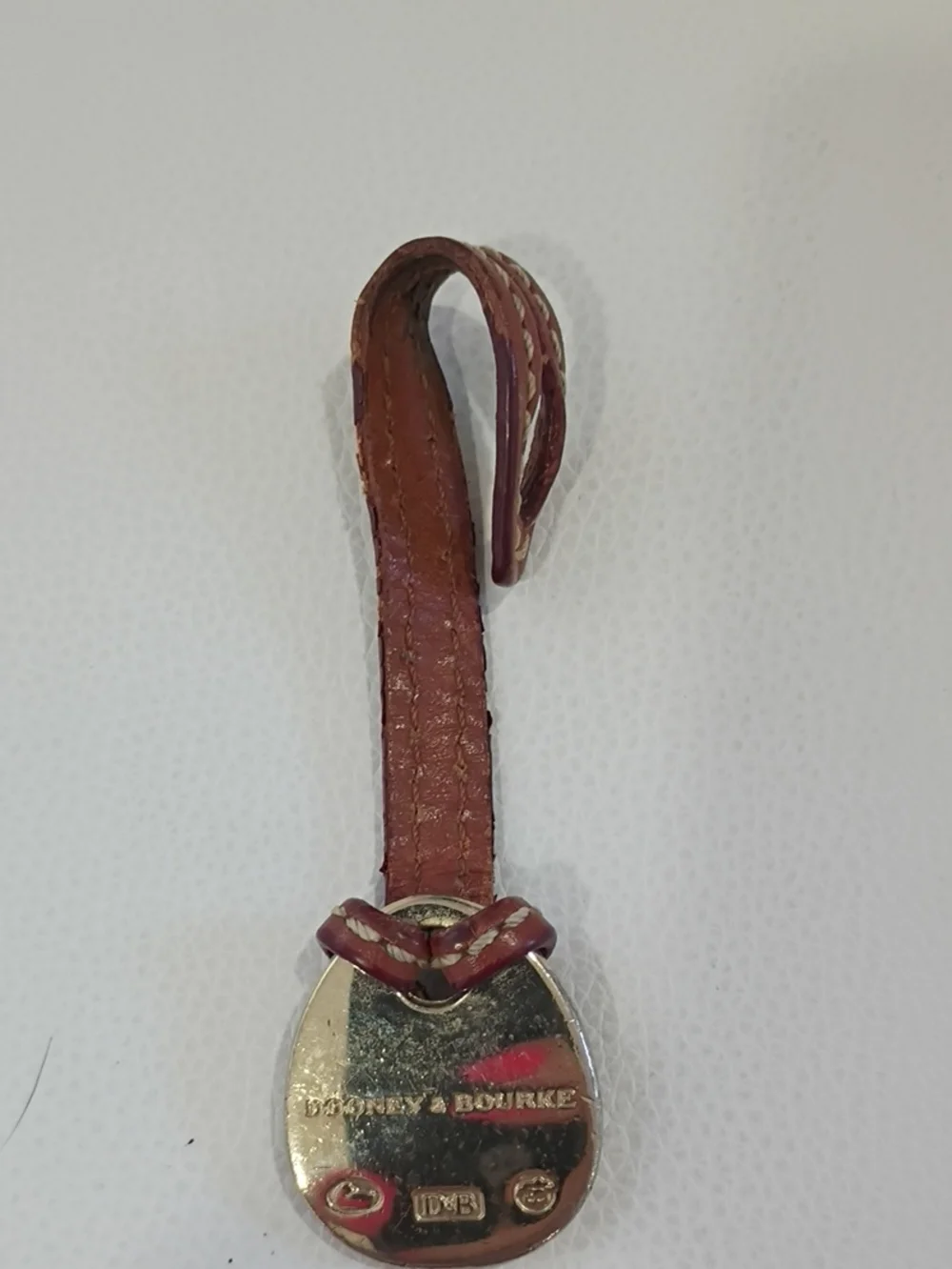 Dooney & Bourke Brown Leather Strap Key Charm with Silver Teardrop